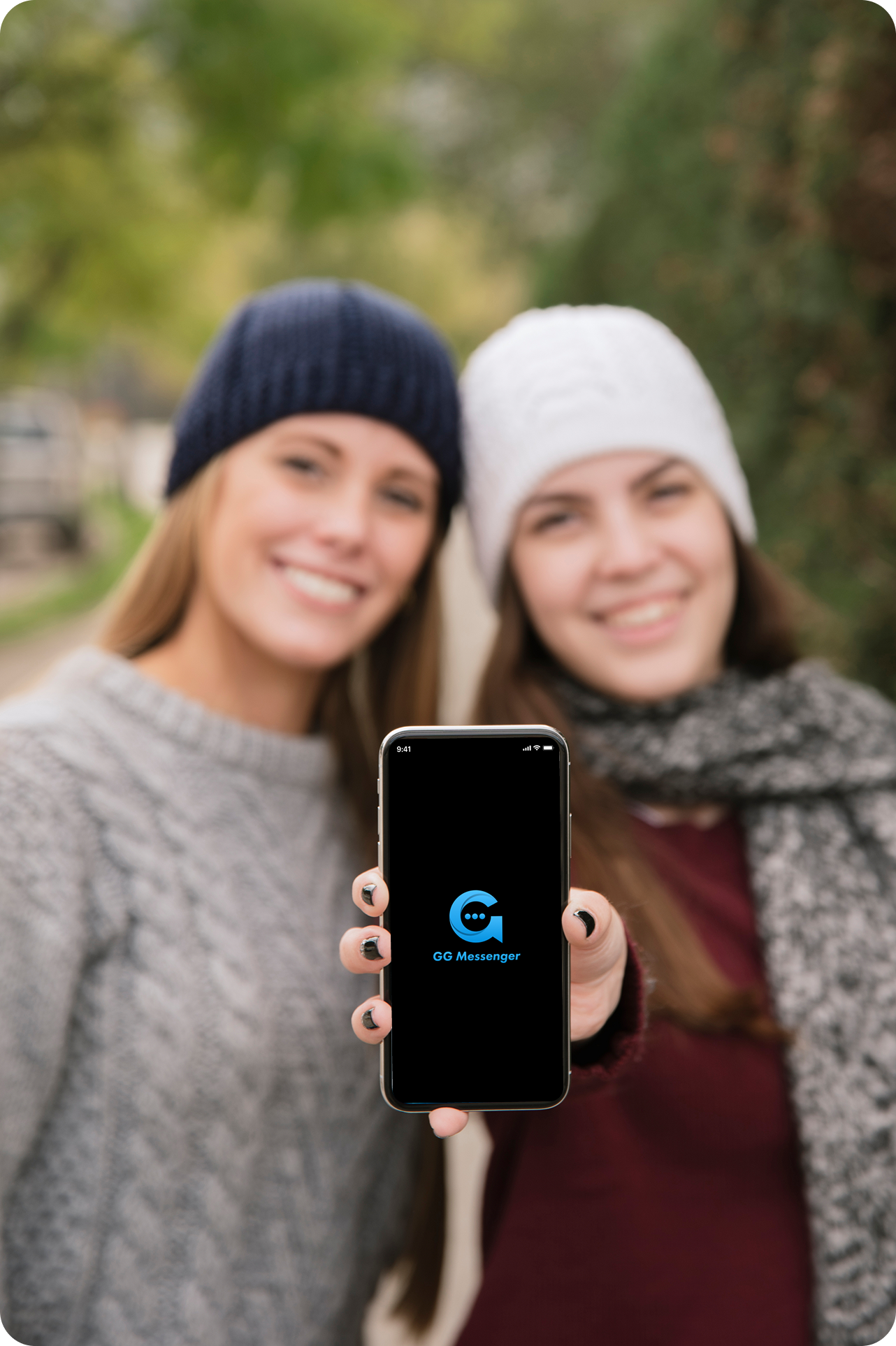 People showing GG Messenger on phone